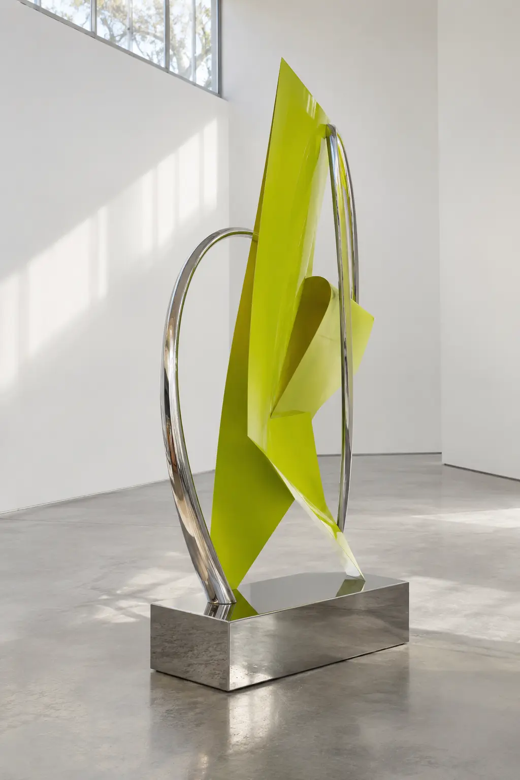 Chartreuse and chrome sculpture by Ife Kalu
